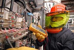 UPS technician performing preventive UPS maintenance